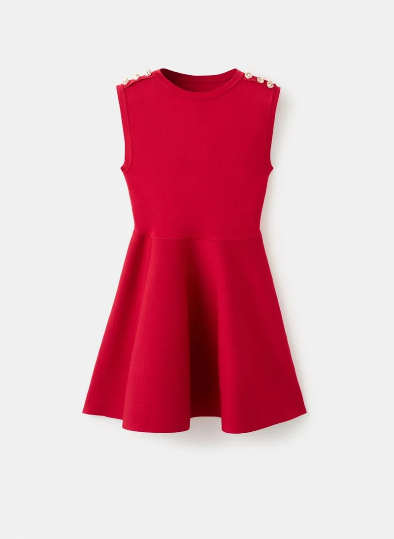 Mango  Peplum knit dress with buttons for Women | Best Price UAE